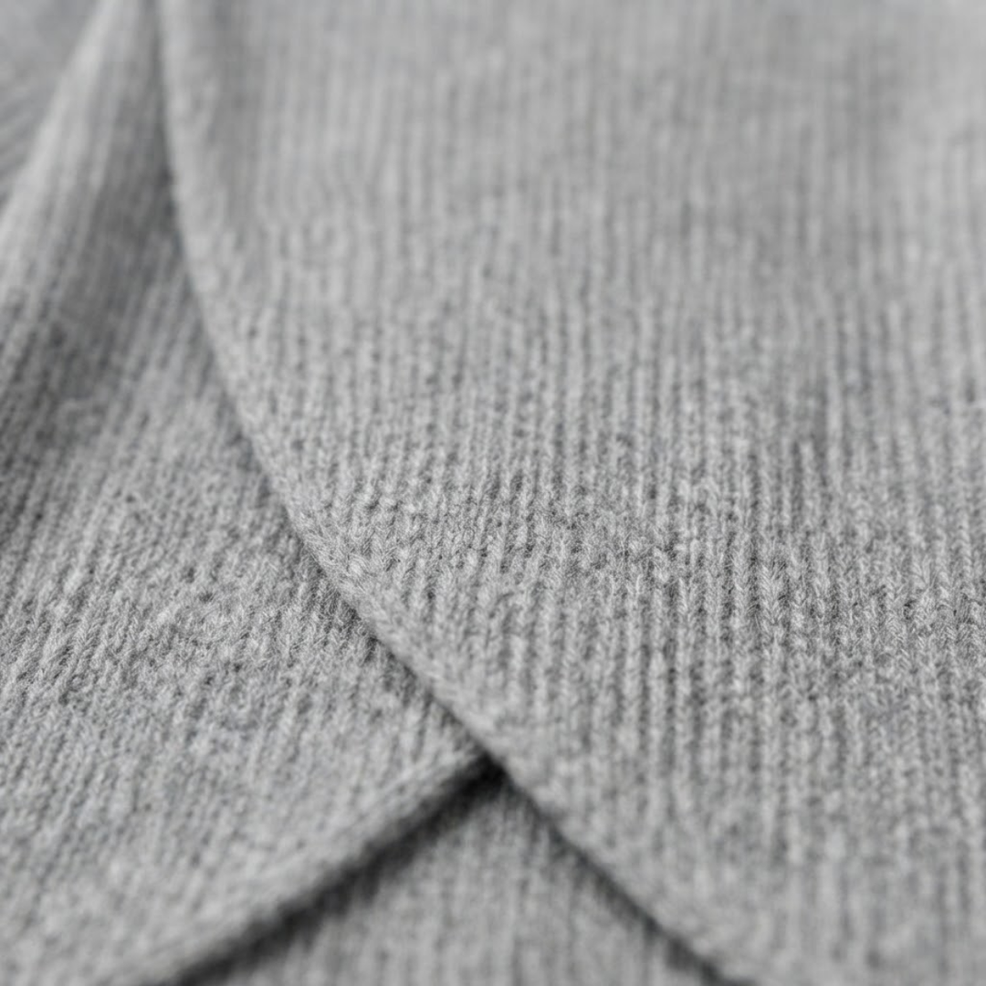 Women's Ribbed Sweater with Asymmetrical Slit Hem